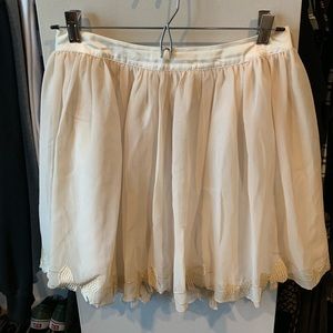 Cream skirt w/ gold accent lace bottom